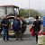 Гръцки фермер гони бежанци с трактор