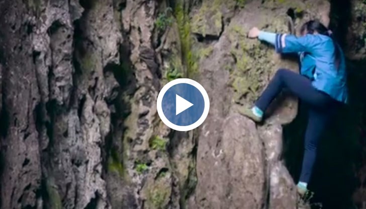 Китайка катери 100-метрови отвесни скали без въжета и никаква алпийска осигуровка