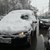Затрупана със сняг кола се движи по софийските улици
