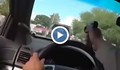 Полицай засне как стреля по заподозрени по време на гонка