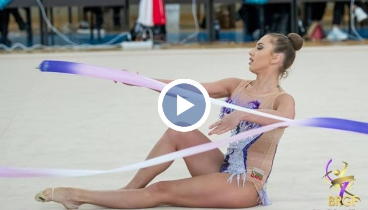 Катрин спечели златото за съчетанието си с лента и то благодарение на перфектното си изпълнение... и на певицата Лейди Гага