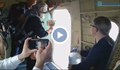Руски свещеник прави водосвет от самолет