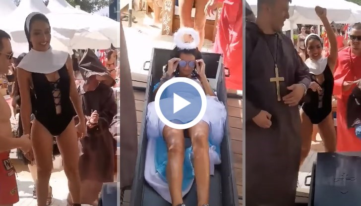 Сервитьорка с шампанско, колега с черен кръст, а четирима инквизитори носят черен ковчег