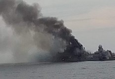 Кадрите показват че крайцерът е легнал на дъното с левия