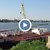 Плаващ кран ще разтоварва тлеещите баржи в река Дунав