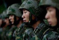 Китайските въоръжени сили са в повишена бойна готовност след като