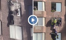 Спасиха жена, висяща от прозорец на 20-тия етаж на горяща сграда в Ню Йорк