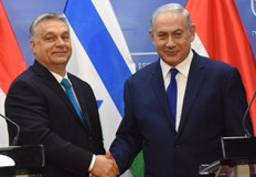 Въпреки заповедта за арест Орбан приветства израелския премиер с отворени