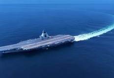 Корабът пътува към Шанхай без самолети на бордаМинистерството на отбраната