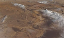 Сняг затрупа пясъчните дюни в Сахара