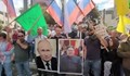 Палестинците носят портрети на Путин и Ким по време на демонстрации